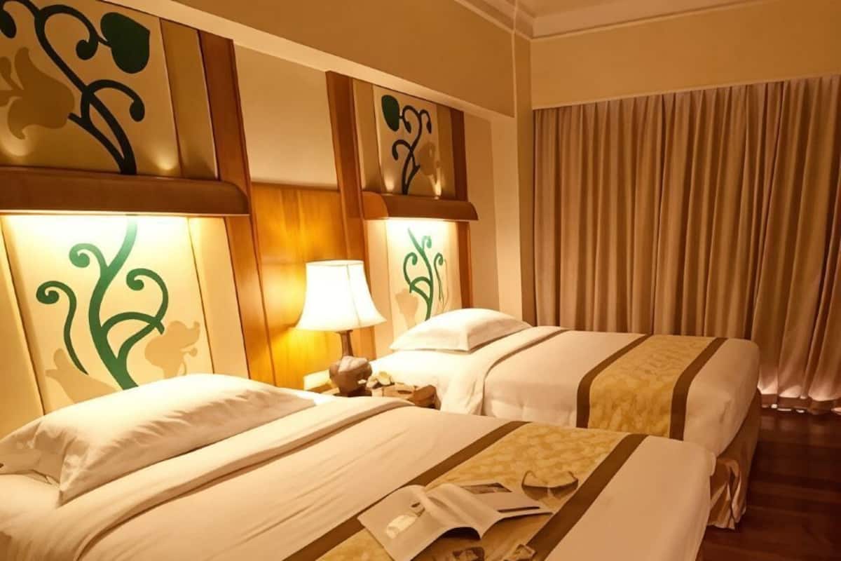 Habitación Deluxe con 1 cama matrimonial o 2 individuales | Minibar, caja de seguridad en la habitación y insonorización