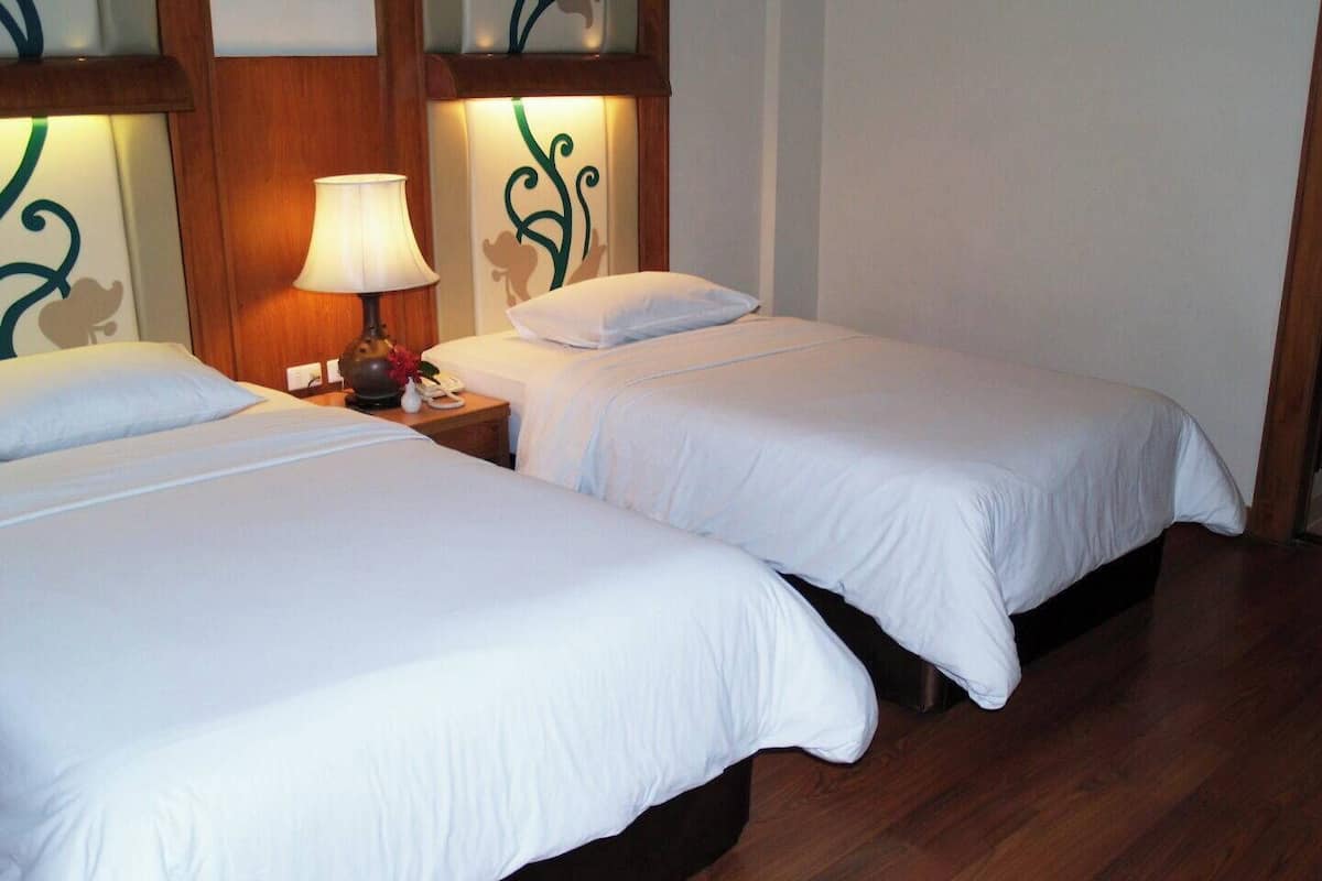 Kamar Double atau Twin Deluks | Minibar, brankas, kedap suara, dan tempat tidur lipat/tambahan