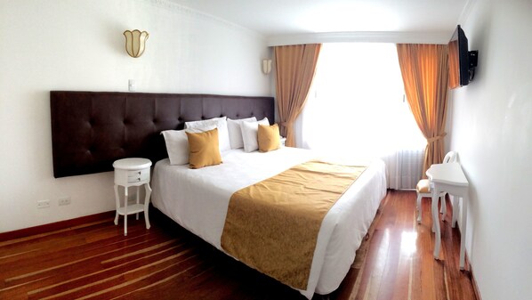 Egyptian cotton sheets, premium bedding, down duvets, minibar