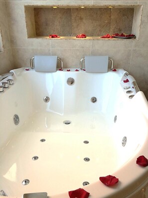 Designer toiletries, hair dryer, towels
