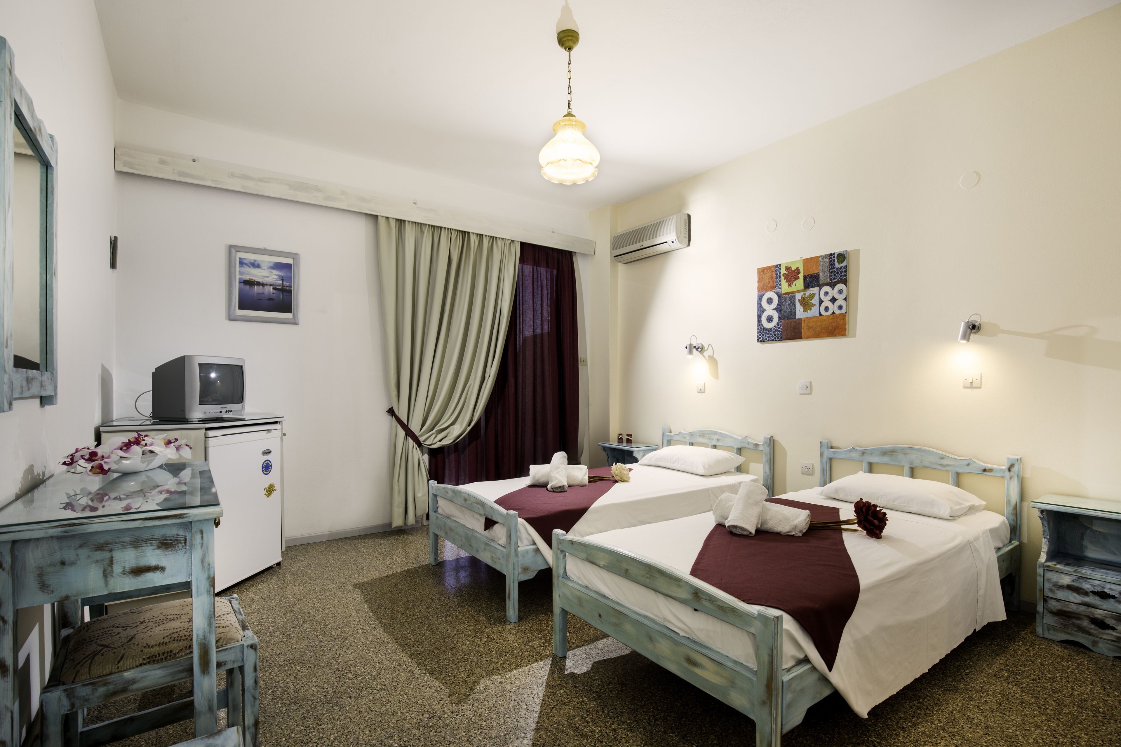 twin room | in-room safe, individually furnished, desk, blackout curtains