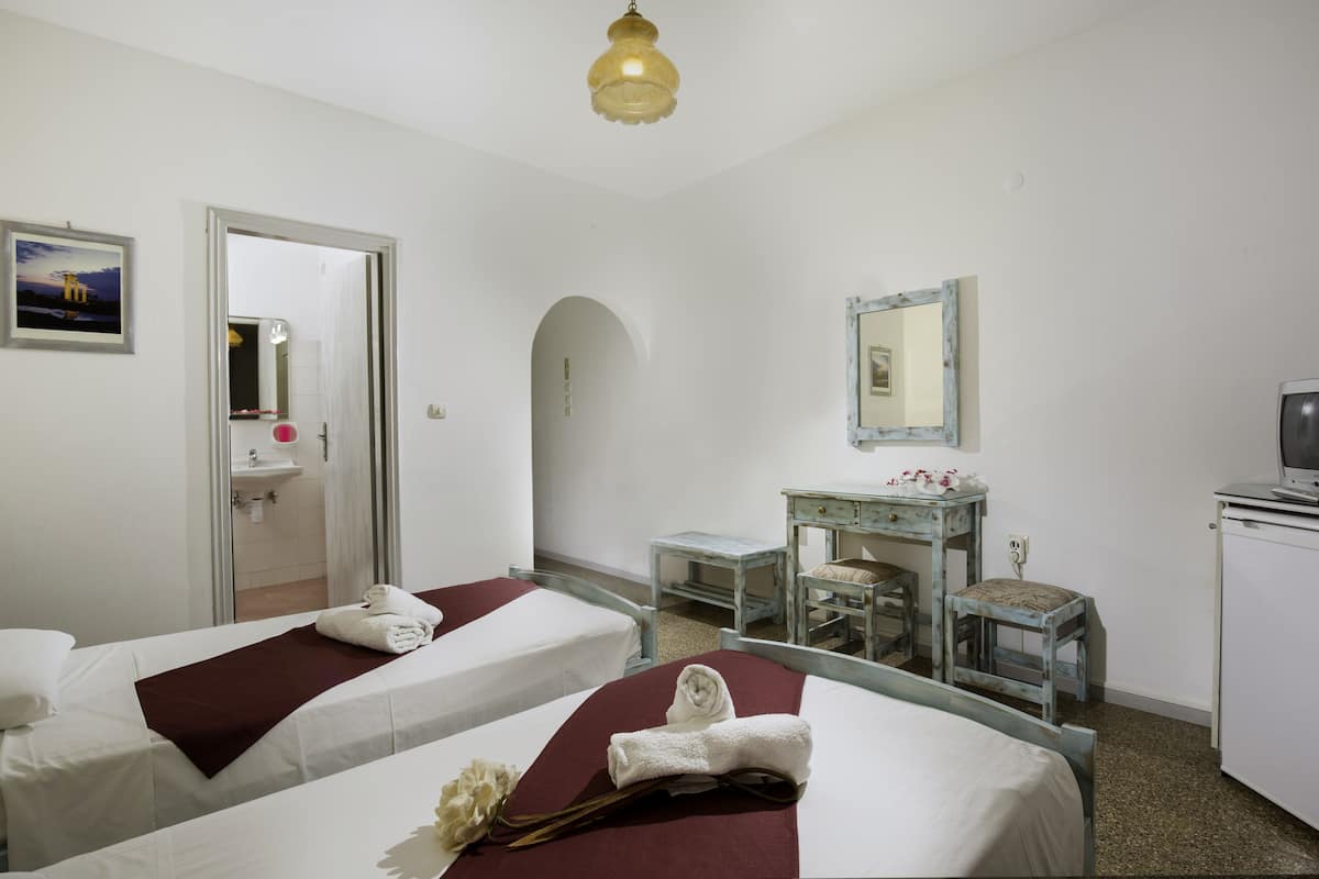 twin room | in-room safe, individually furnished, desk, blackout curtains