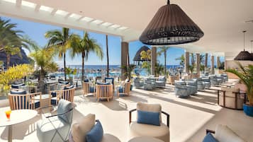 5 bars/lounges, poolside bar