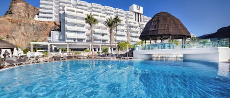 2 outdoor pools, pool umbrellas, pool loungers