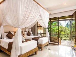 Family Bungalow, 2 Bedrooms, Garden View, Garden Area | Minibar, in-room safe, individually decorated, desk - Alas Petulu Villa Resort and Spa (Ubud)