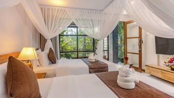 Bungalow Keluarga, 2 kamar tidur, pemandangan kebun, area taman | Minibar, brankas, didekorasi berbeda-beda, dan meja kerja