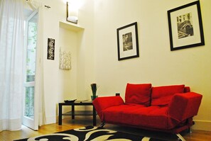 Chambre Triple | Coin séjour