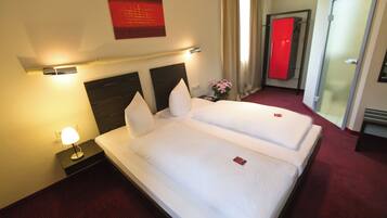 Hypo-allergenic bedding, desk, laptop workspace, iron/ironing board