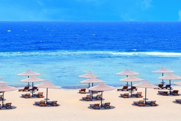 Private beach, beach umbrellas, beach towels, scuba diving