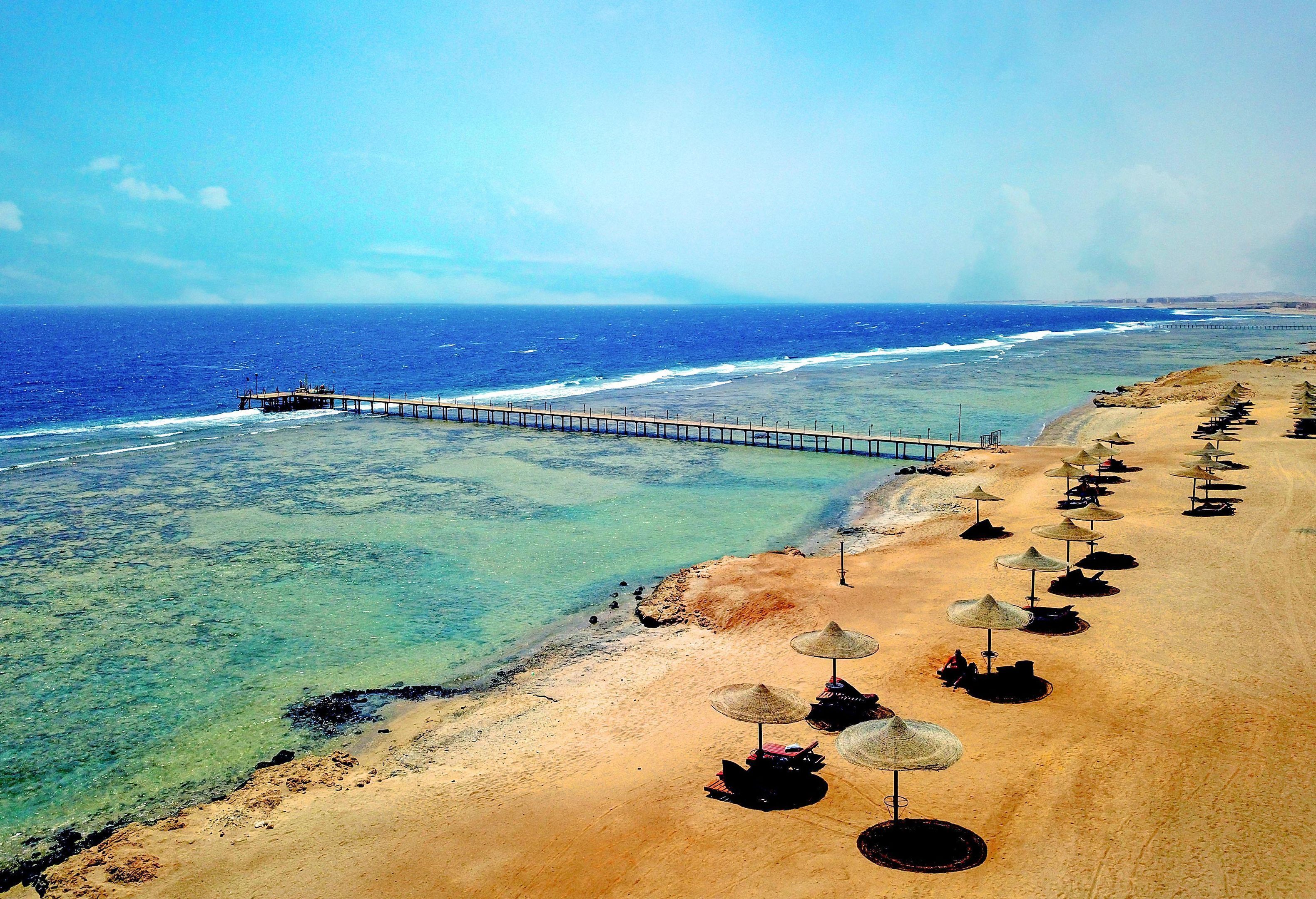 Private beach, beach umbrellas, beach towels, scuba diving