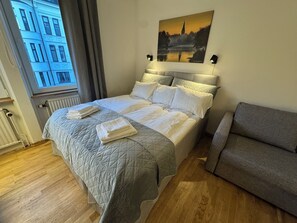 Phòng 4 dành cho gia đình | Bộ đồ giường cao cấp, minibar, bàn ủi/dụng cụ ủi quần áo 