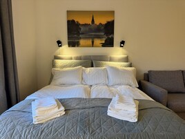Family room | Premium bedding, minibar, iron/ironing board, free WiFi