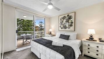 Deluxe Apartment, 2 Bedrooms, Sea View | 1 bedroom, in-room safe, iron/ironing board, cribs/infant beds