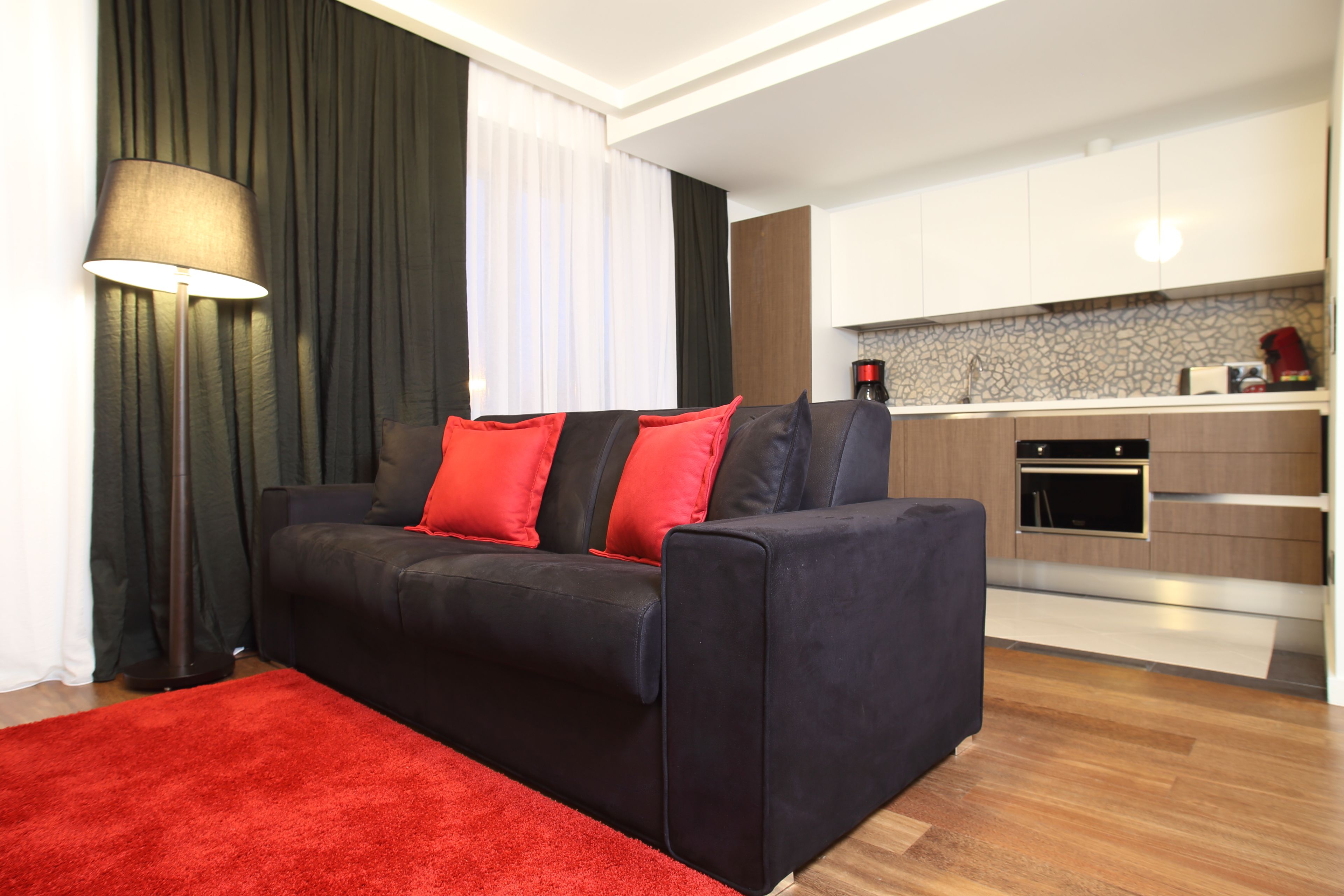 Exclusive Apartment, 1 Bedroom | Living room | Flat-screen TV, DVD player