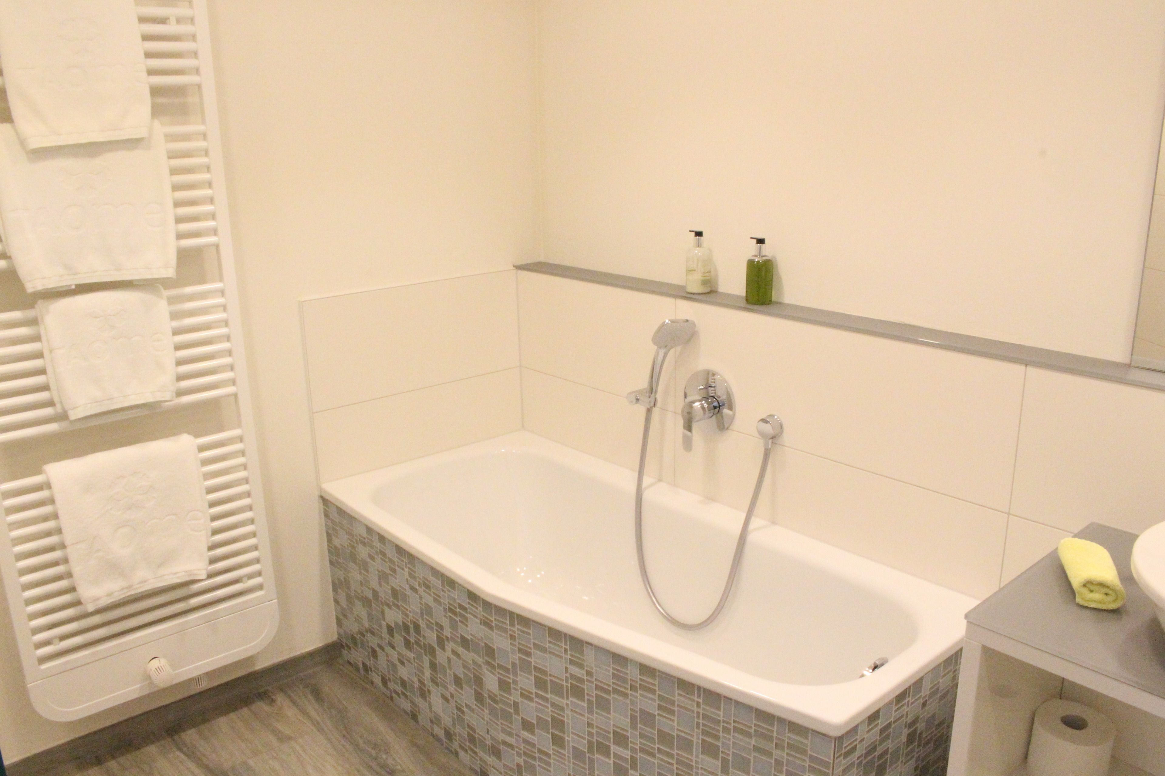junior suite | bathroom | shower, hair dryer, towels