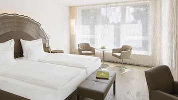 Hypo-allergenic bedding, free minibar, in-room safe, desk