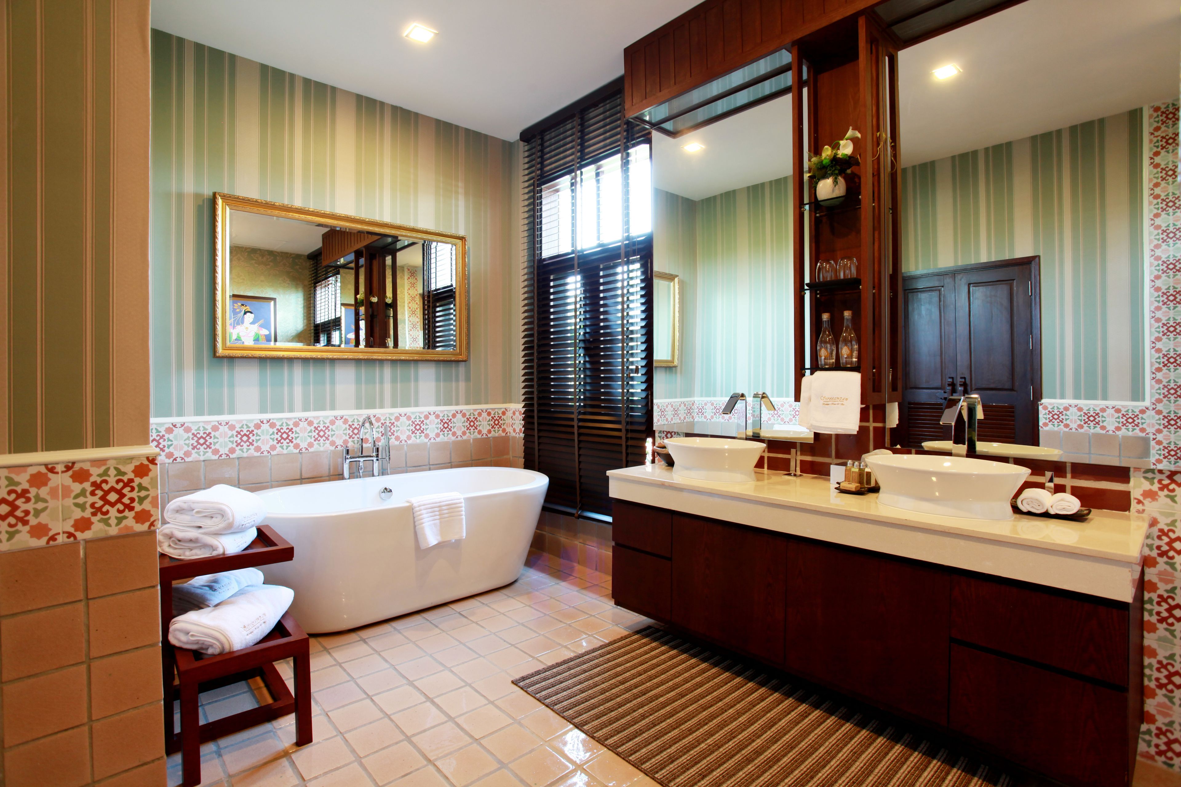 s class suite | bathroom | separate bathtub and shower, rainfall showerhead, designer toiletries