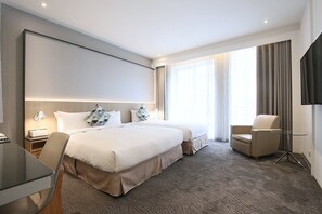 Family Triple Room, Balcony | Free minibar, in-room safe, desk, laptop workspace
