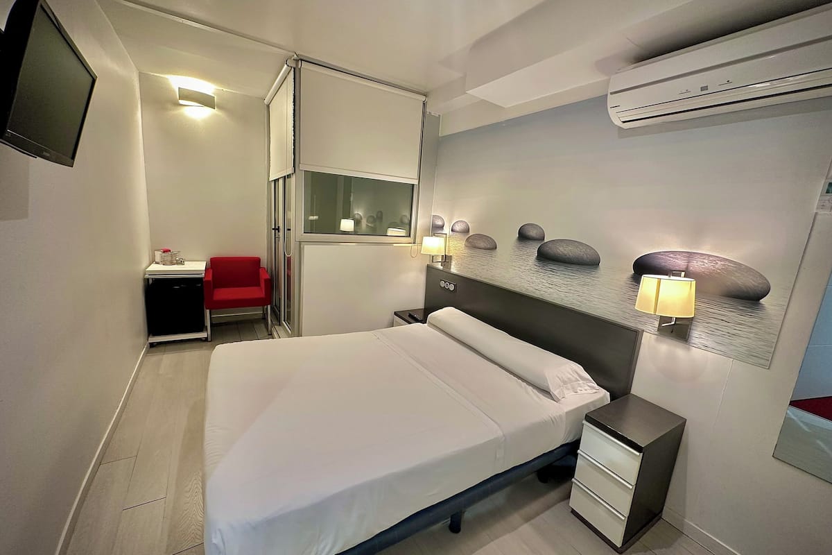 Kamer | 1 slaapkamer, een minibar, een strijkplank/strijkijzer, gratis wifi
