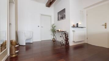 Comfort Apartment, 1 Bedroom | Living room | Flat-screen TV