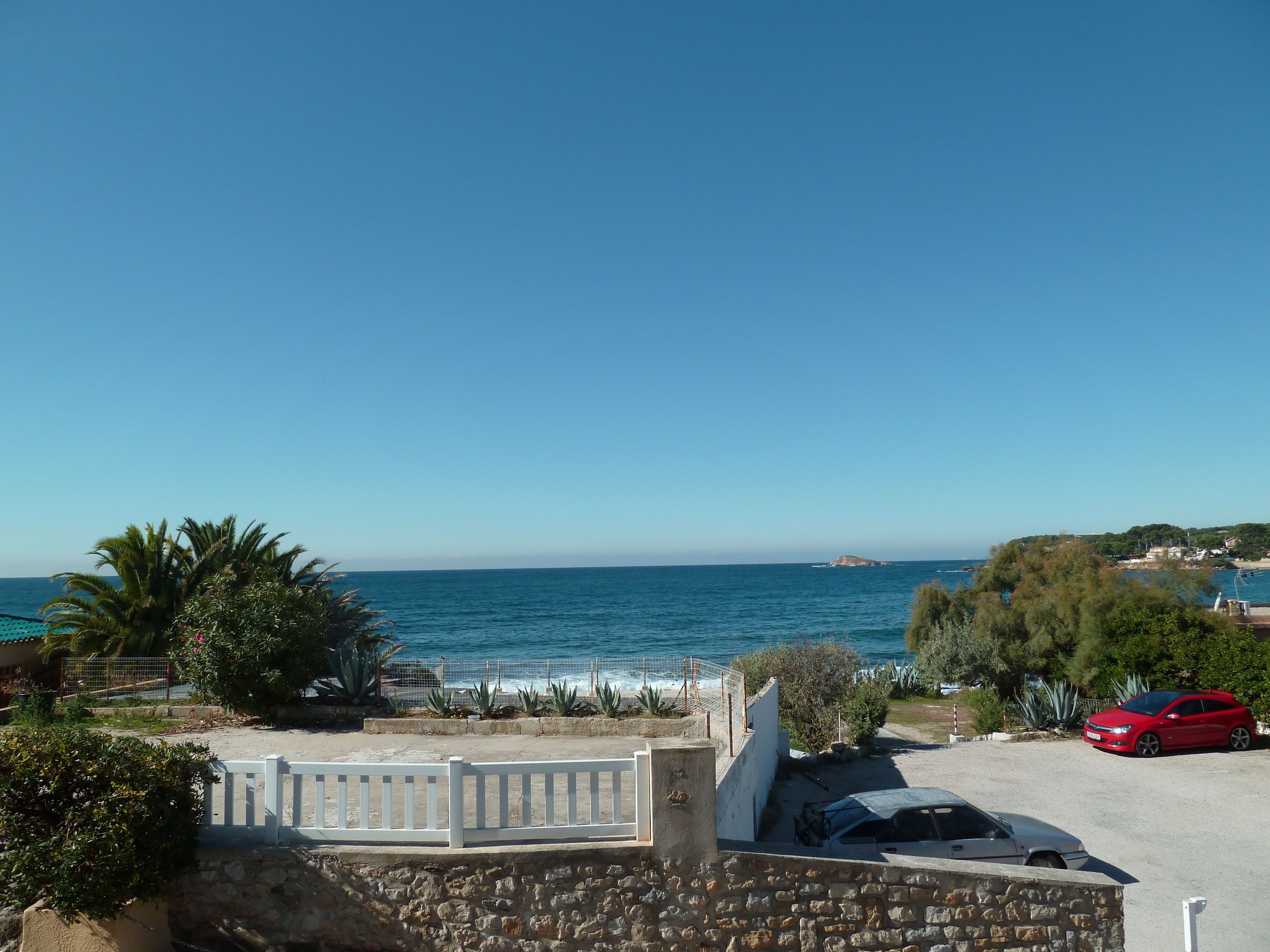 on the beach, sun-loungers, beach umbrellas