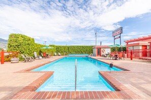 Seasonal outdoor pool, sun loungers