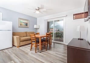 Deluxe Suite, 1 King Bed with Sofa bed, Non Smoking, Pool View | Living area | 43-inch LED TV with digital channels, TV, pay movies