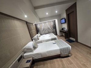 Basic Triple Room | Individually furnished, desk, blackout curtains, free WiFi