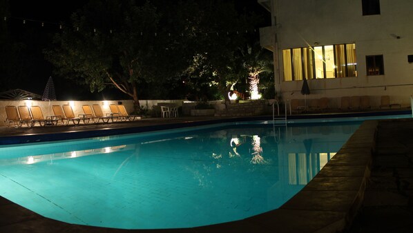 Seasonal outdoor pool, pool umbrellas, pool loungers