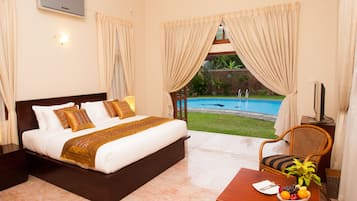 Kamar Deluks | Seprai premium, minibar, brankas, dan setrika/meja setrika