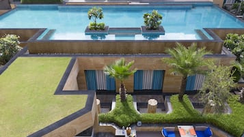 Outdoor pool, open 6:30 AM to 8:30 PM, free pool cabanas, pool umbrellas