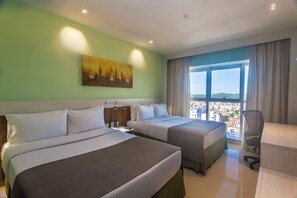 Standard Twin Room, 2 Double Beds | Minibar, in-room safe, desk, blackout drapes