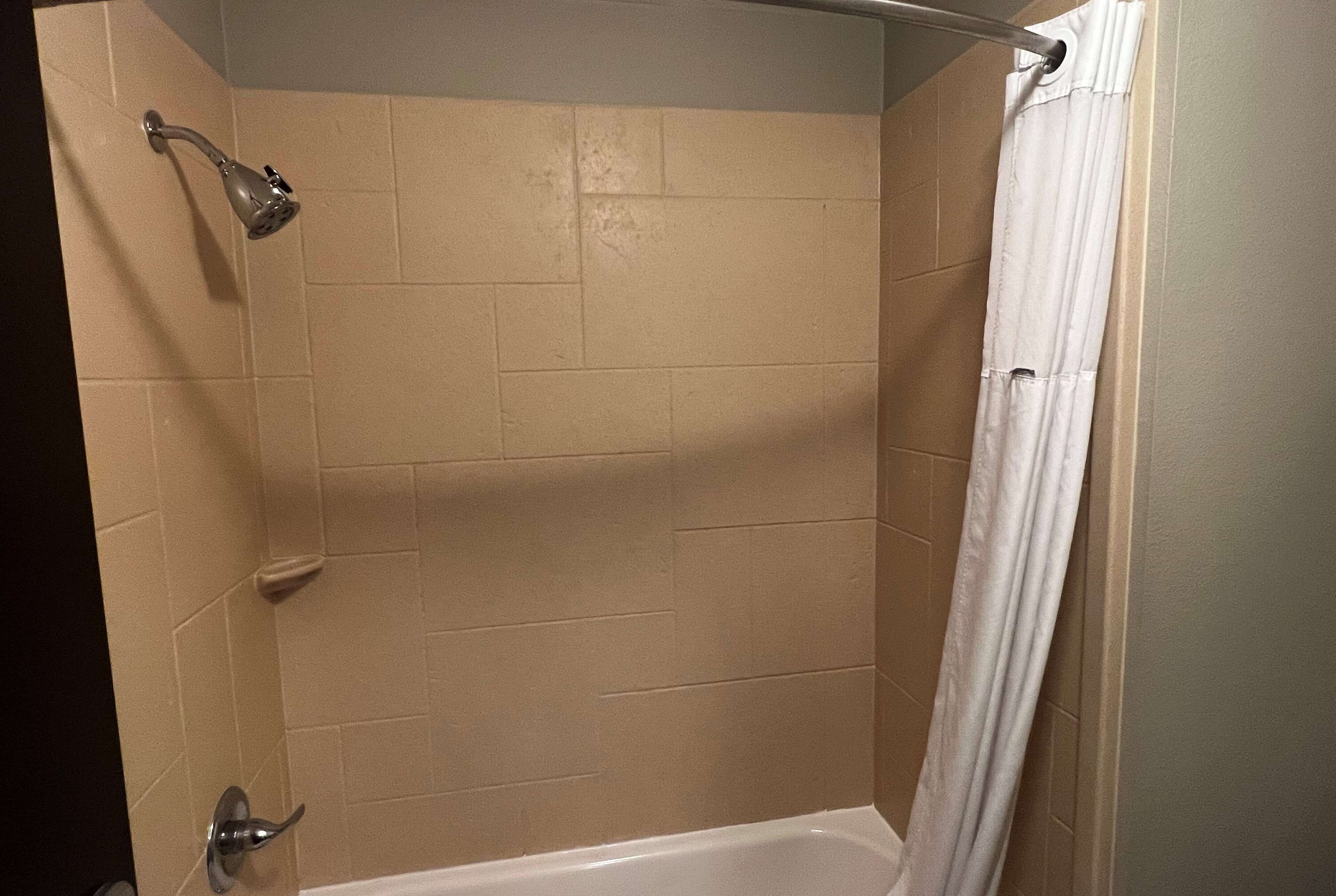 combined shower/bathtub, free toiletries, hair dryer, towels