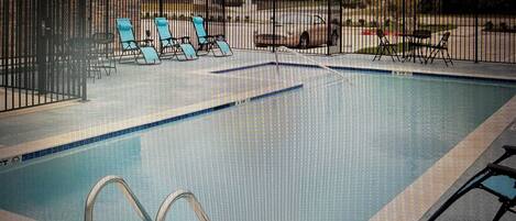 Outdoor pool, open 9:00 AM to 10:00 PM, pool umbrellas, pool loungers