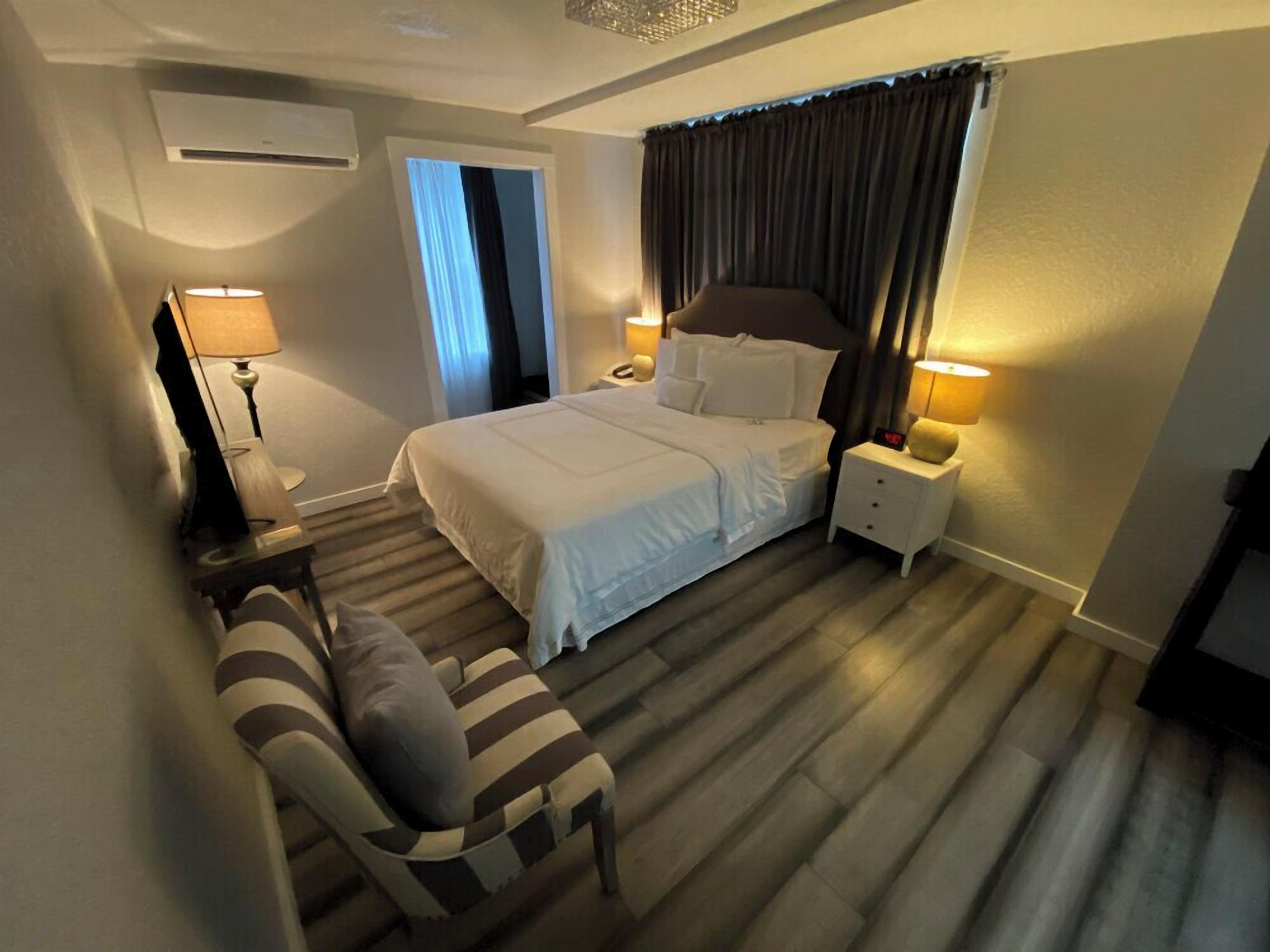 Kamar Single Ekonomi, 1 Tempat Tidur Queen | 1 kamar tidur, seprai premium, dan didekorasi berbeda-beda