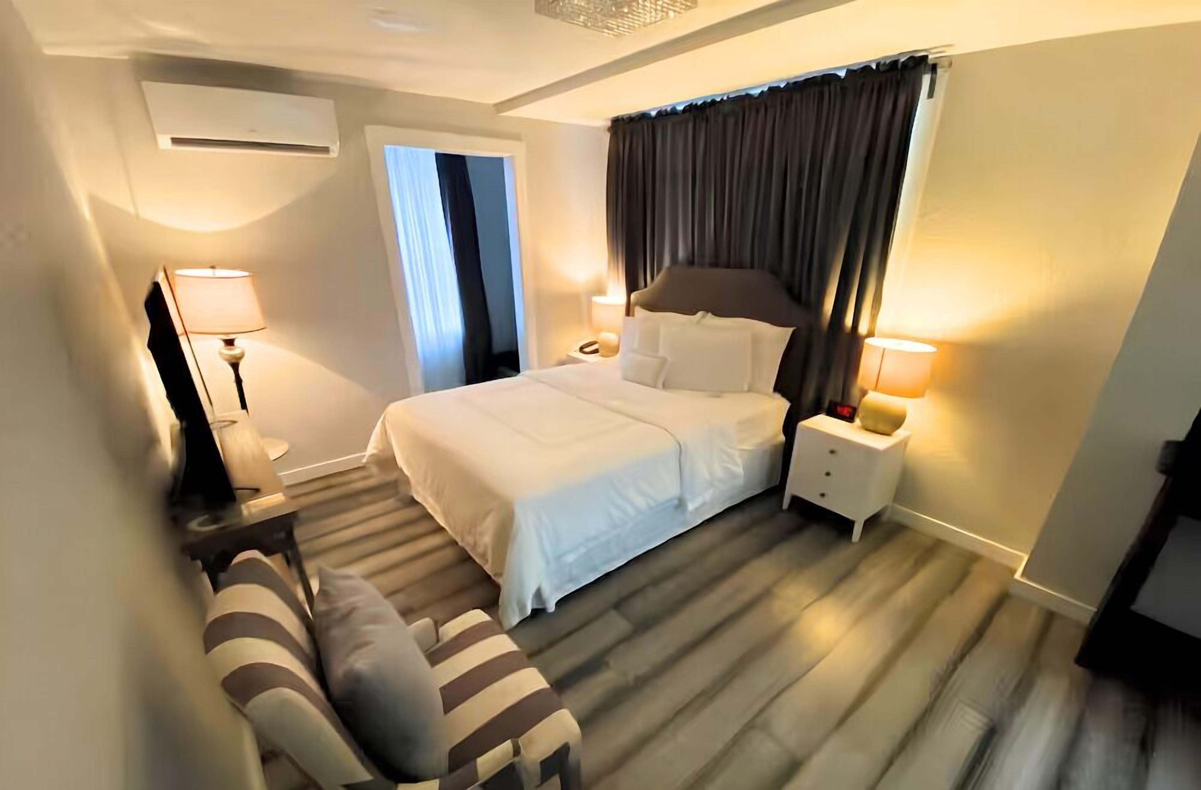 Economy-Einzelzimmer, 1 Queen-Bett, Kühlschrank, Stadtblick | 1 Schlafzimmer, hochwertige Bettwaren, Bügeleisen/Bügelbrett