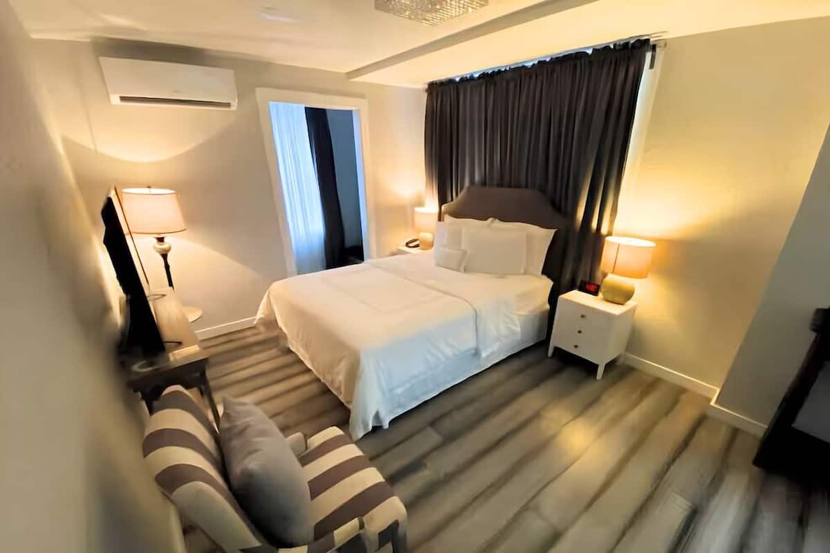 Economy Single Room, 1 Queen Bed, Refrigerator, City View | 1 bedroom, premium bedding, iron/ironing board, WiFi (free)