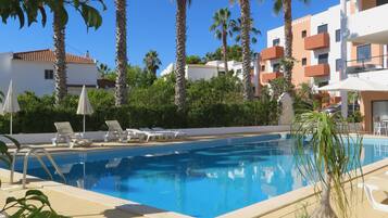 Outdoor pool, pool umbrellas, pool loungers