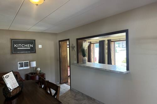 Family Suite, 2 Bedrooms | Private kitchen | Full-size fridge, microwave, coffee/tea maker, freezer
