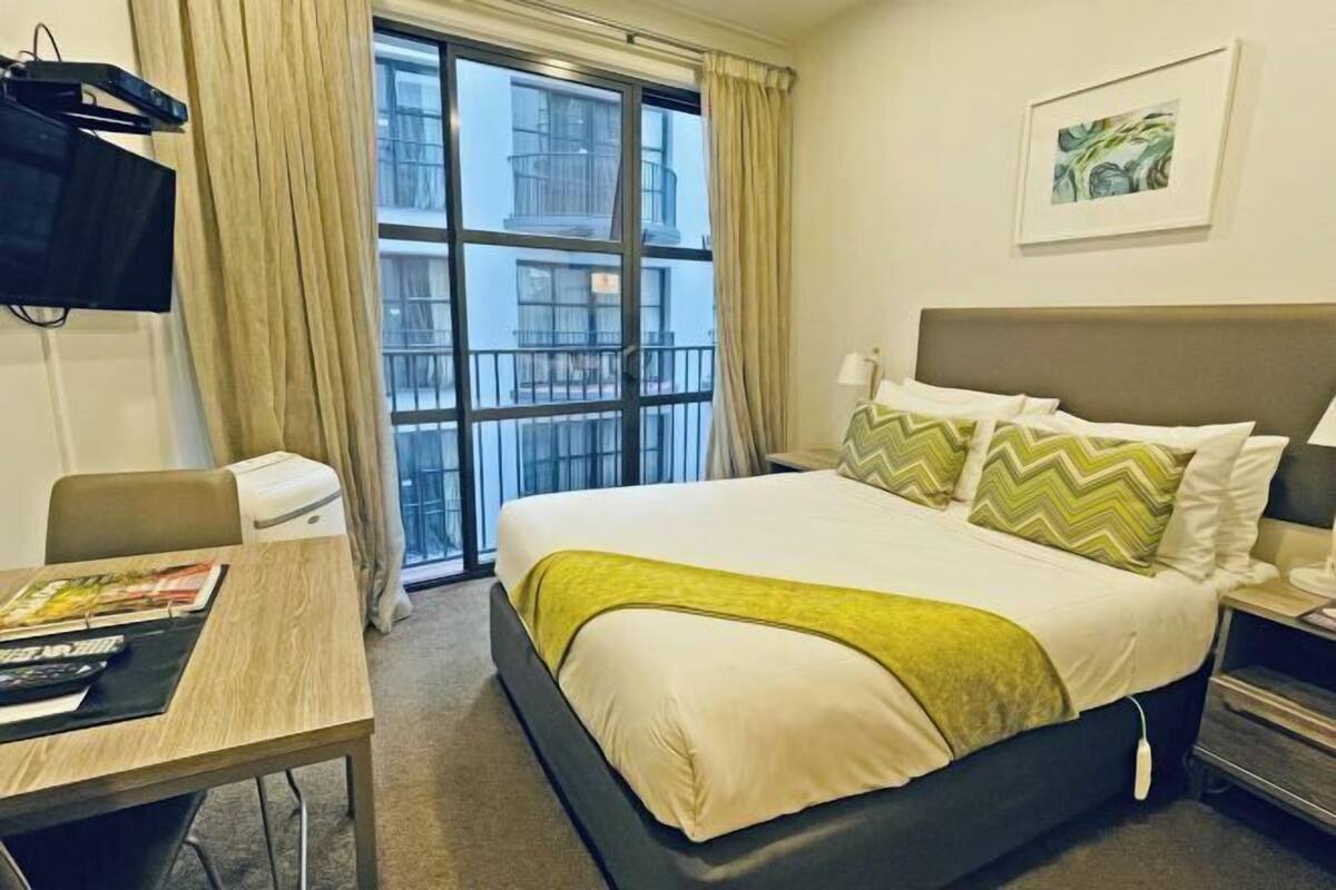 2 bedrooms, desk, blackout drapes, iron/ironing board