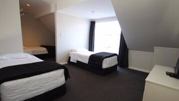 Two Bedroom | Desk, blackout curtains, iron/ironing board, free WiFi