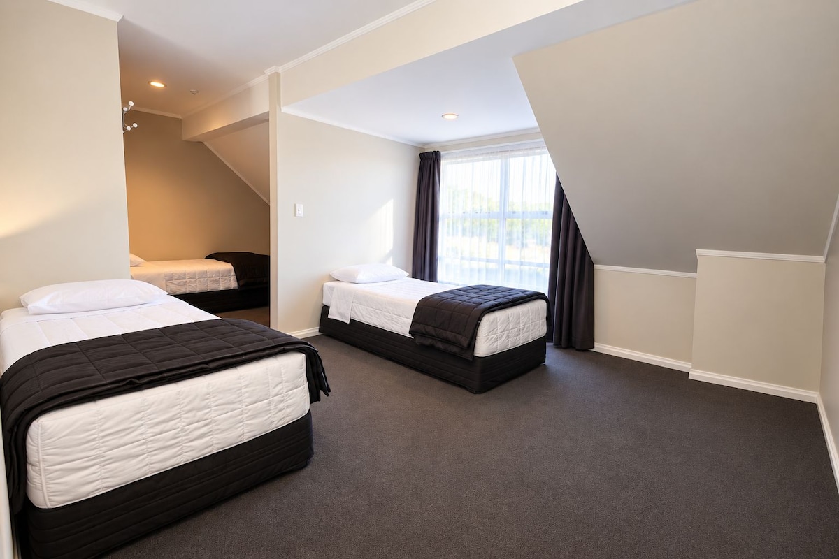 Two Bedroom | Desk, blackout drapes, iron/ironing board, WiFi (free)