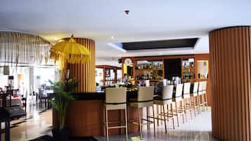 Breakfast, lunch served; international cuisine, al fresco dining