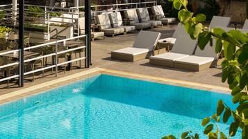 Seasonal outdoor pool, open 8 AM to 7 PM, pool umbrellas, sun loungers
