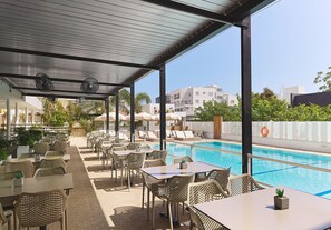 Seasonal outdoor pool, open 8 AM to 7 PM, pool umbrellas, sun loungers