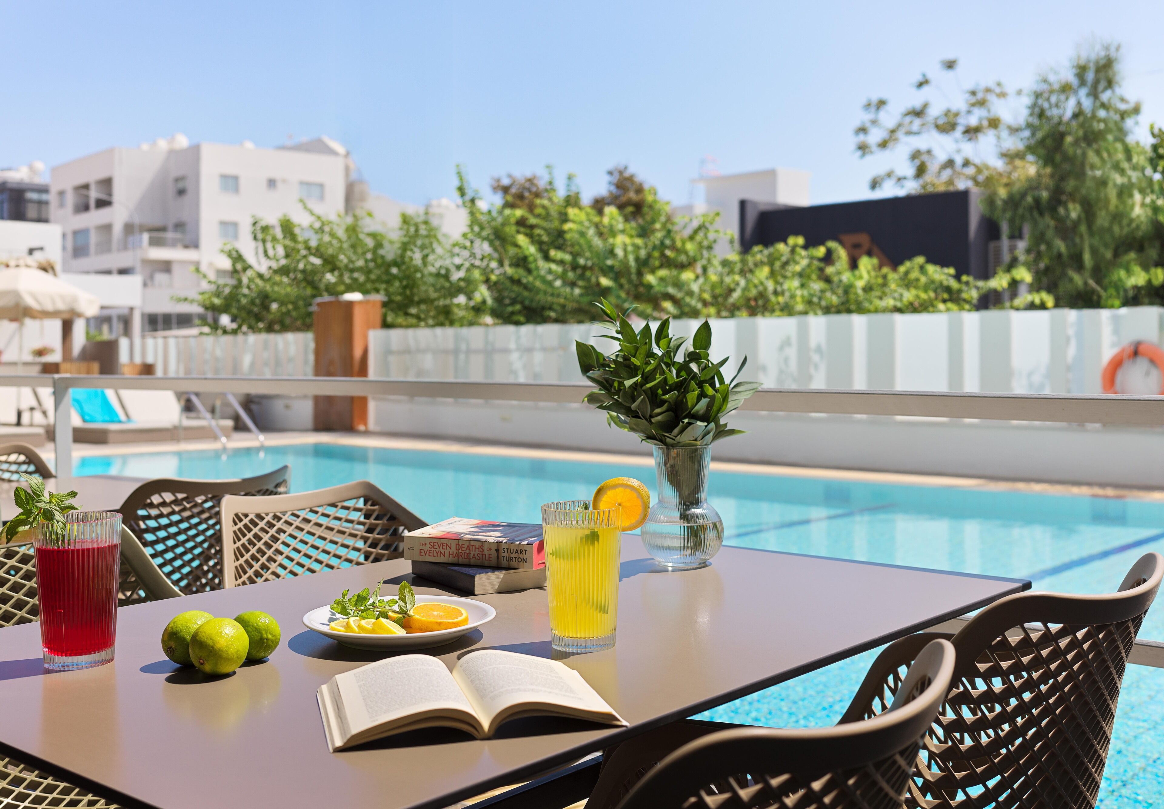 Seasonal outdoor pool, open 8 AM to 7 PM, pool umbrellas, sun loungers