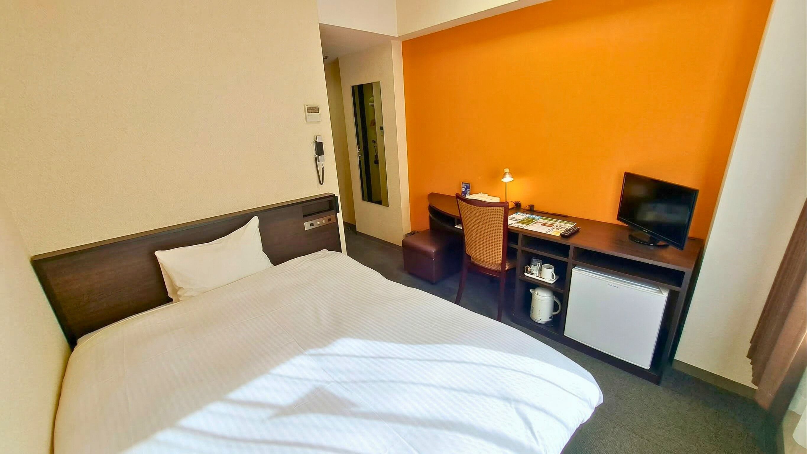 Semi-Double Room, Non Smoking | Down comforters, desk, laptop workspace, blackout drapes