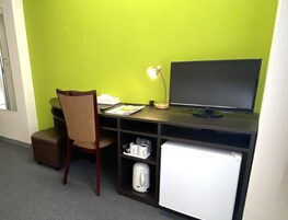 Down comforters, desk, laptop workspace, blackout drapes