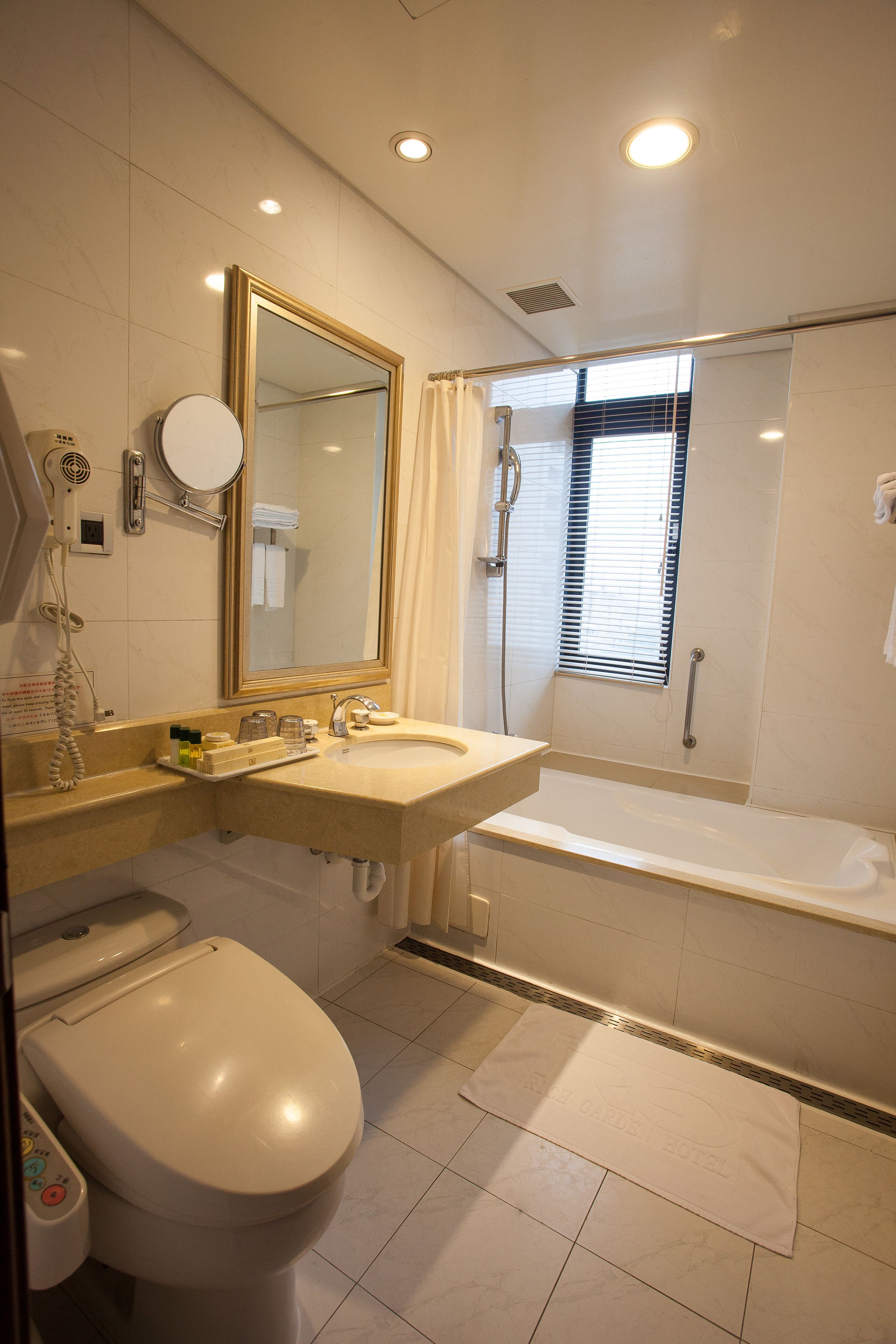 deluxe triple room, multiple beds, ensuite | bathroom | hair dryer, slippers, electronic bidet, soap