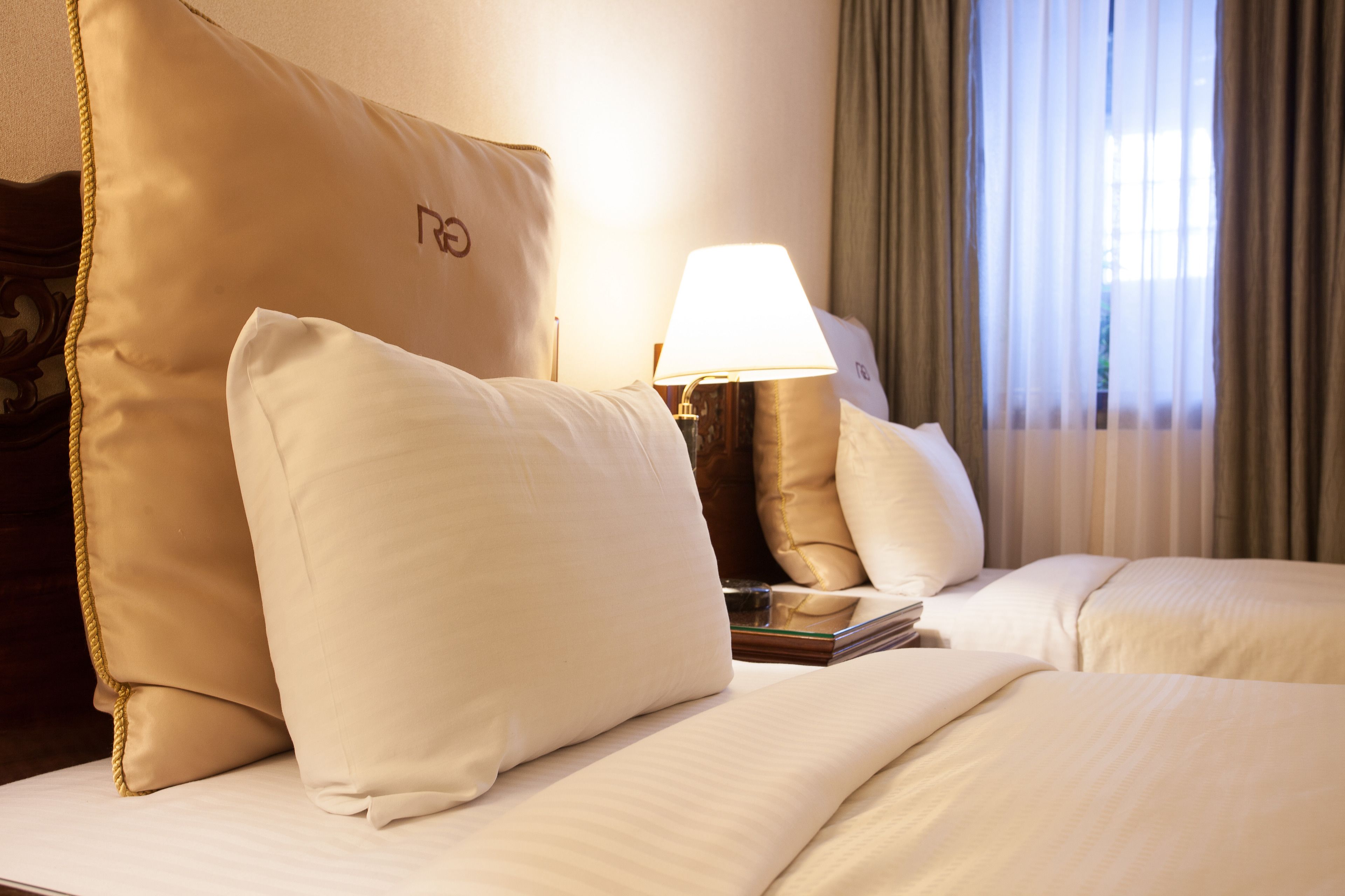 business twin room, 2 single beds, no windows | 1 bedroom, down duvets, desk, laptop workspace